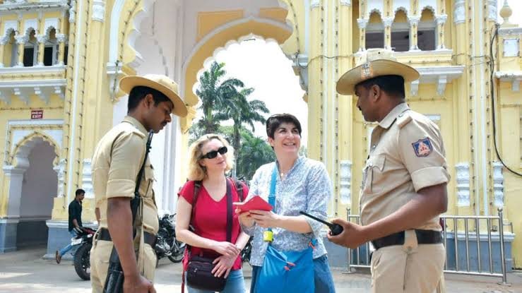 City Police assisting visitors outside the Palace