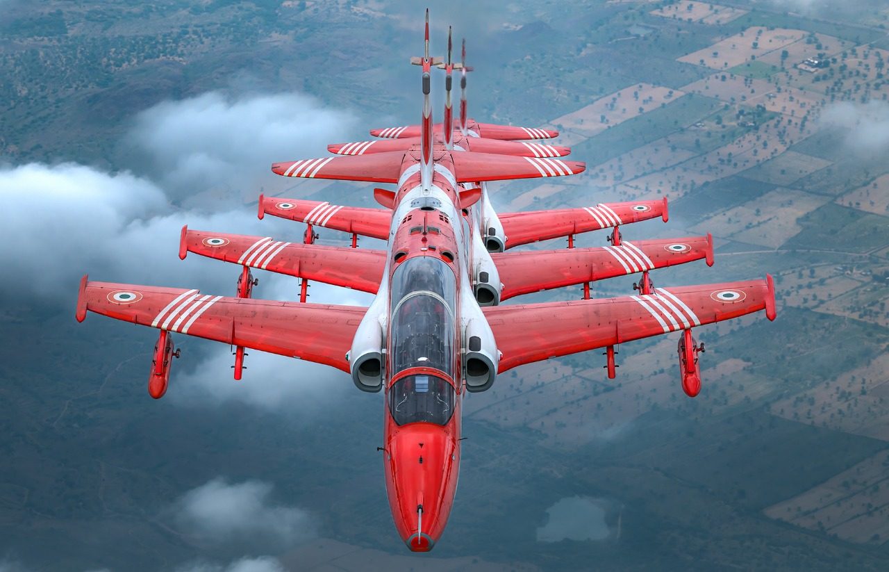 The team head-on in close formation